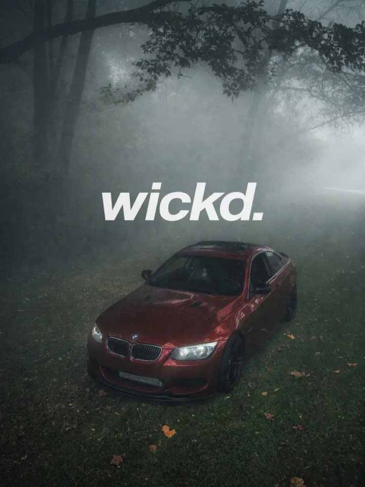 wickd poster - red bmw foggy woods